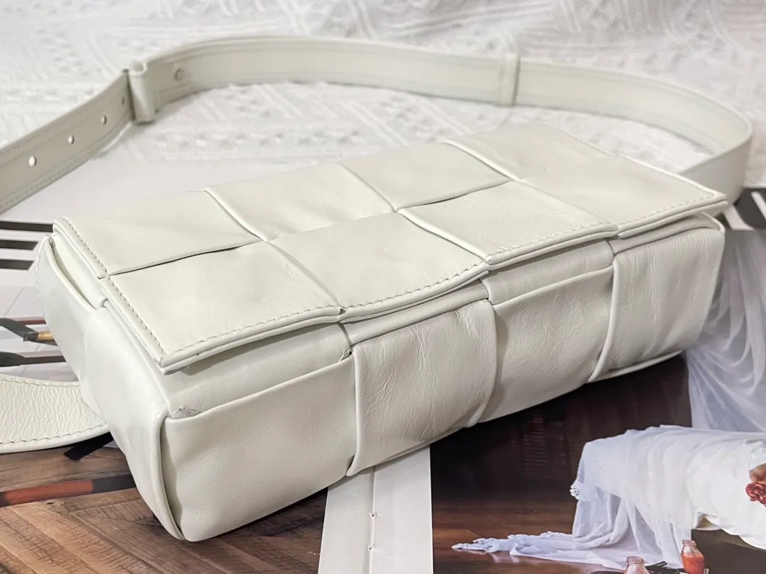 #𝐓𝐇𝐄 𝐁𝐄𝐋𝐓 𝐂𝐀𝐒𝐒𝐄𝐓𝐓𝐄 Checkered waist bag cassette has an updated version🆕The waxed cowhide material is very light and shiny, has a cool feeling, and has the same high-end touch as always. ⚠️The second-generation upgraded version has a long strap of 136cm, tall people can also wear it cross-body at will It is also suitable for boys. It is suitable for couples. It can be used as a handbag, waist bag, crossbody or shoulder bag. It’s small and exquisite, but packs a punch: 💄lipstick 🕶️sunglasses, etc.⋯pack it all! It continues the square shape of the cassette bag and does not deform after loading. It has a very concave shape! Model; 6815# S18.5x5x9.5